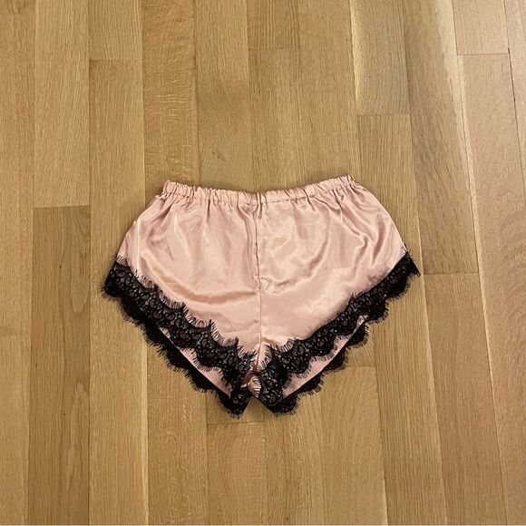 SHEIN Pants - Silky pink pajama shorts with black lace from Shein